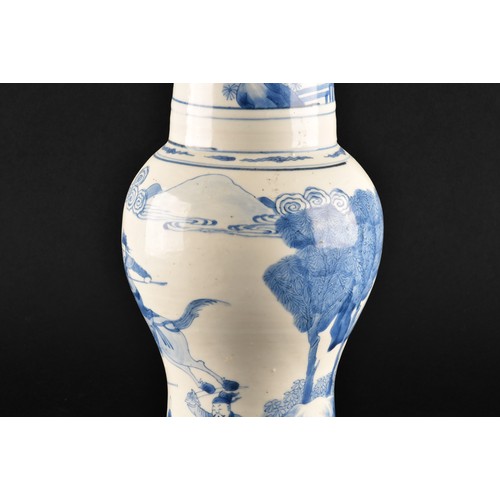 1 - A large Chinese Kangxi blue and white baluster vase, decorated with scenes of warriors and figures o... 