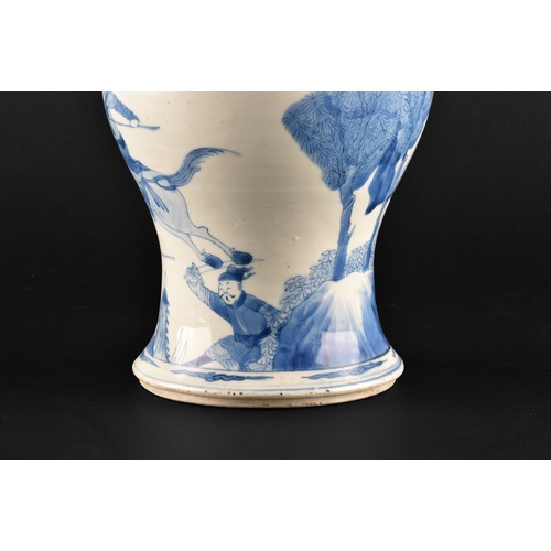 1 - A large Chinese Kangxi blue and white baluster vase, decorated with scenes of warriors and figures o... 