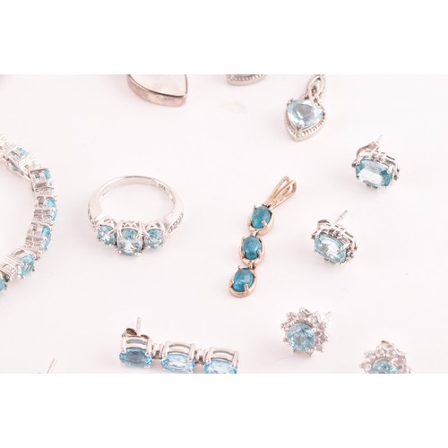 113 - A silver, blue and white topaz line bracelet, together with a silver chain suspended with four silve... 