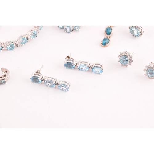 113 - A silver, blue and white topaz line bracelet, together with a silver chain suspended with four silve... 