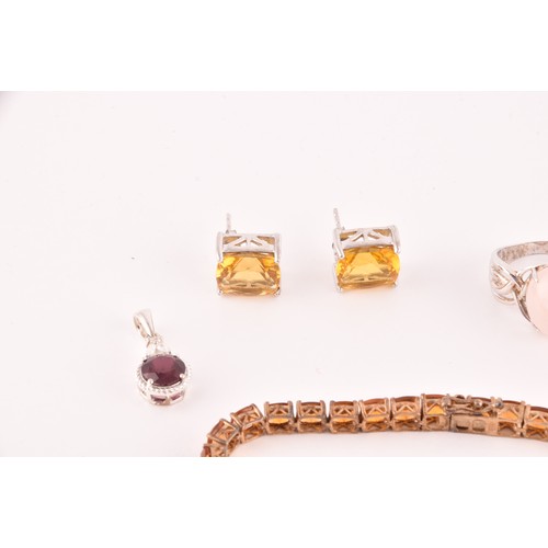 115 - A group of silver and gem set jewellery, to include a silver gilt and orange citrine line bracelet, ... 