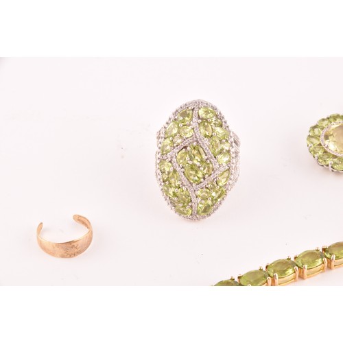 117 - A silver gilt and peridot line bracelet, together with a CZ line bracelet (lacking one stone), a sil... 