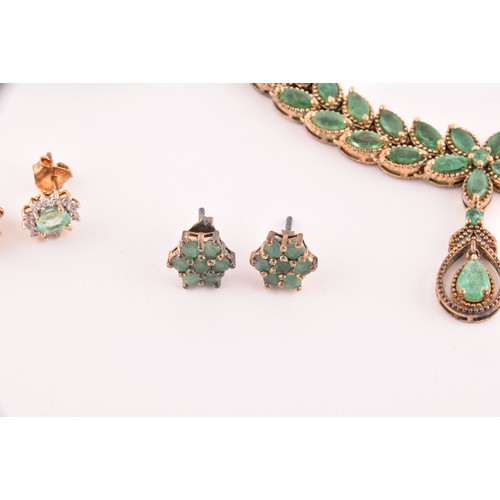 118 - A silver gilt and emerald pendant necklace set with mixed marquise-shaped emeralds, together with a ... 