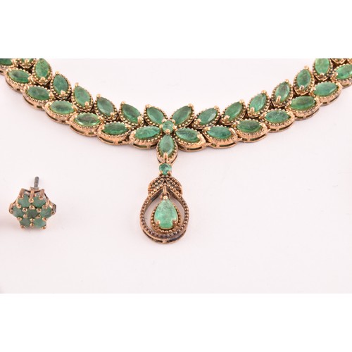 118 - A silver gilt and emerald pendant necklace set with mixed marquise-shaped emeralds, together with a ... 