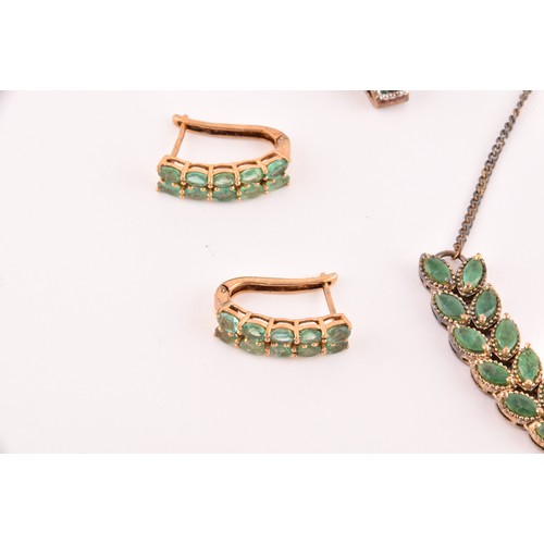 118 - A silver gilt and emerald pendant necklace set with mixed marquise-shaped emeralds, together with a ... 