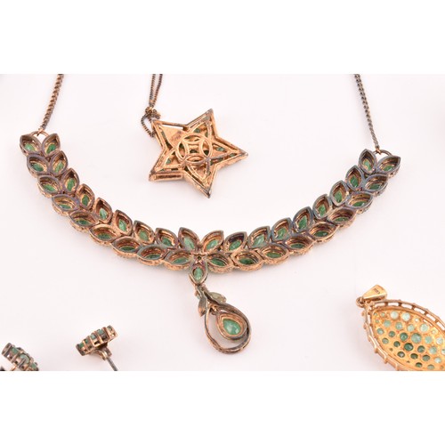 118 - A silver gilt and emerald pendant necklace set with mixed marquise-shaped emeralds, together with a ... 