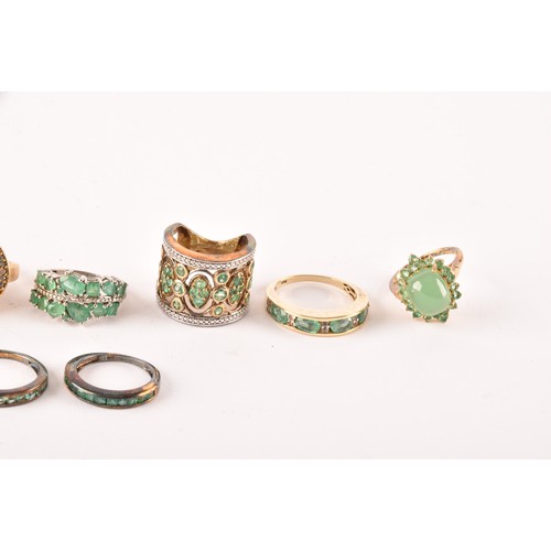 120 - A group of eleven silver and gemstone rings, including a silver and emerald ring set with fourteen m... 