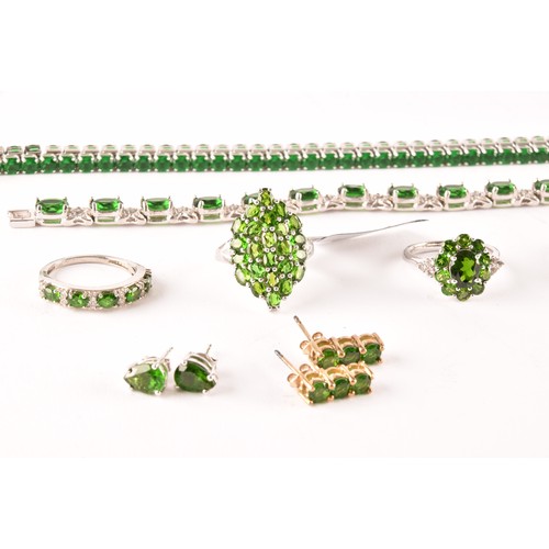 123 - A group of silver and Russian chrome diopside jewellery items, including a line bracelet set with mi... 