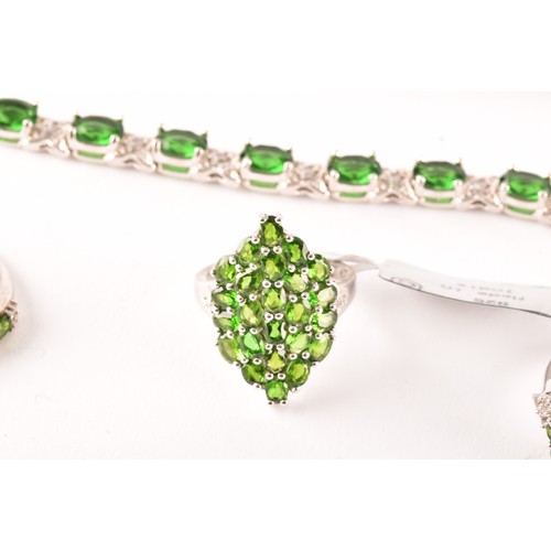 123 - A group of silver and Russian chrome diopside jewellery items, including a line bracelet set with mi... 