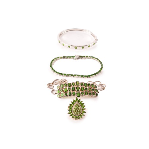 124 - A silver and chrome diopside bracelet, the central segment collet-set with mixed-cut stones, on chai... 