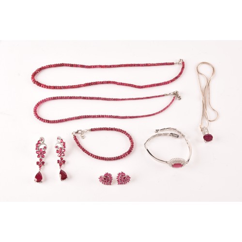 129 - A pair of silver and ruby dress earrings, of elongated articulated design, together with a pair of s... 