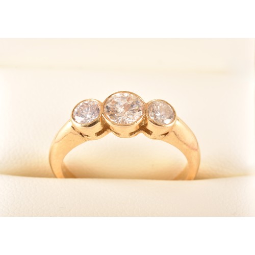 133 - A yellow gold and diamond ring, set with three round brilliant-cut diamonds of approximately 1.20 ca... 