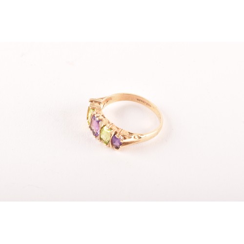 138 - A 9ct yellow gold, amethyst, and peridot ring, set with five alternating mixed oval-cut stones, size... 