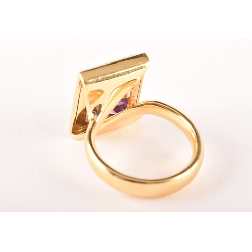 145 - An Andrew Geoghenan 18ct yellow gold rectangular cluster ring, featuring a step-cut citrine, amethys... 