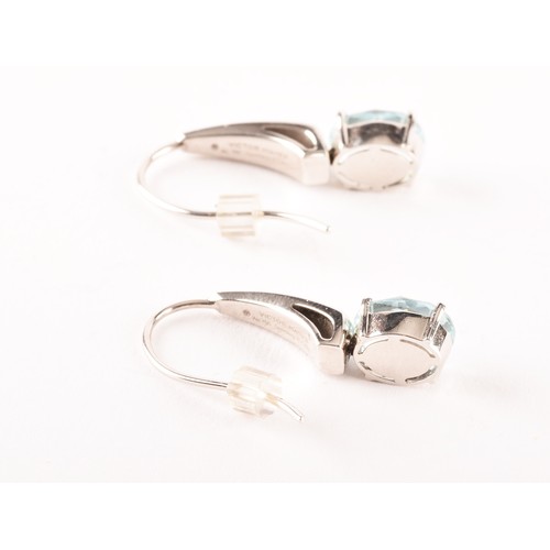 147 - A pair of Victor Mayer aquamarine and diamond earrings, each set with a oval checkerboard cut aquama... 