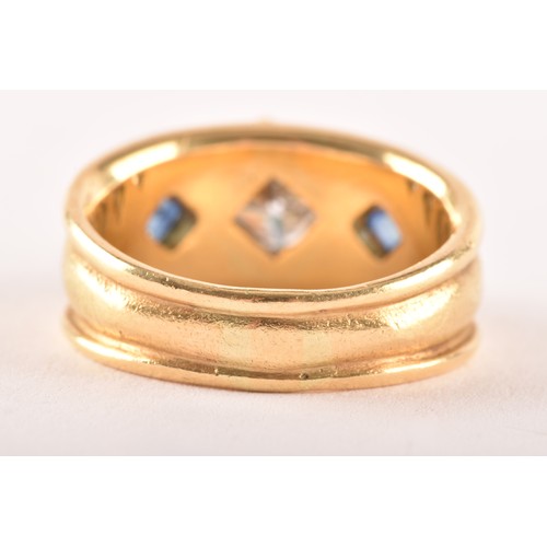 148 - An 18ct yellow gold Byzantine style ring, featuring a rectangular princess-cut diamond set on its ax... 