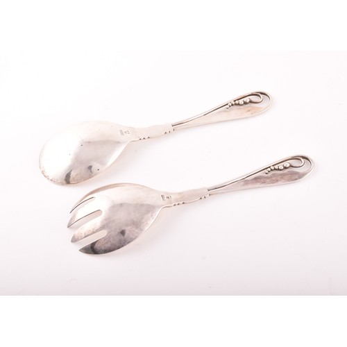 225 - A pair of silver sterling Denmark salad servers by Georg Jensen, '42' pattern, circa 1930's, 19cm, 4... 