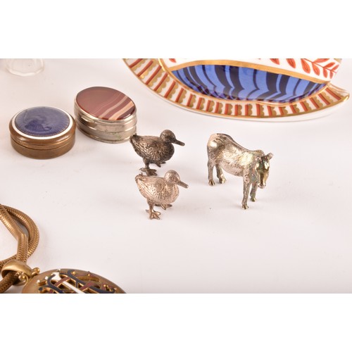 250 - A collection of assorted objet d'art, including a hand painted enamel pill box by Crummles & Co ... 