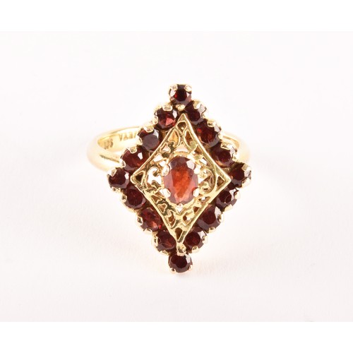 152 - A 9ct yellow gold marquise shape cluster ring set to centre with an oval garnet surrounded by sixtee... 