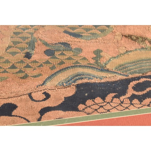 35 - A Chinese late Ming dynasty kesi woven silk panel, depicting mang dragon chasing flaming pearl throu... 