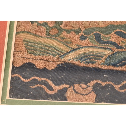 35 - A Chinese late Ming dynasty kesi woven silk panel, depicting mang dragon chasing flaming pearl throu... 