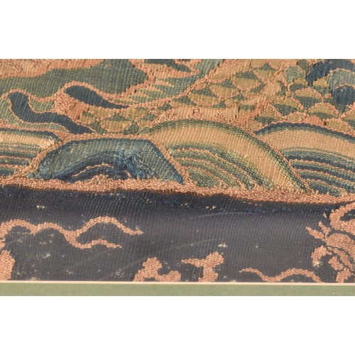 35 - A Chinese late Ming dynasty kesi woven silk panel, depicting mang dragon chasing flaming pearl throu... 