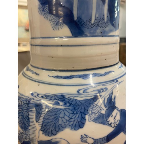 1 - A large Chinese Kangxi blue and white baluster vase, decorated with scenes of warriors and figures o... 