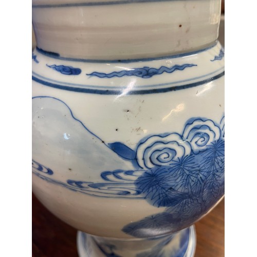 1 - A large Chinese Kangxi blue and white baluster vase, decorated with scenes of warriors and figures o... 