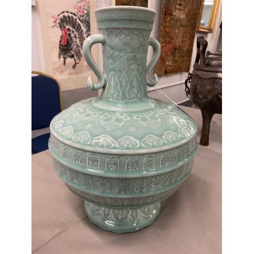 16 - A large Chinese Republic Period celadon glazed 'Longevity' vase, featuring rows of various shou (lon... 