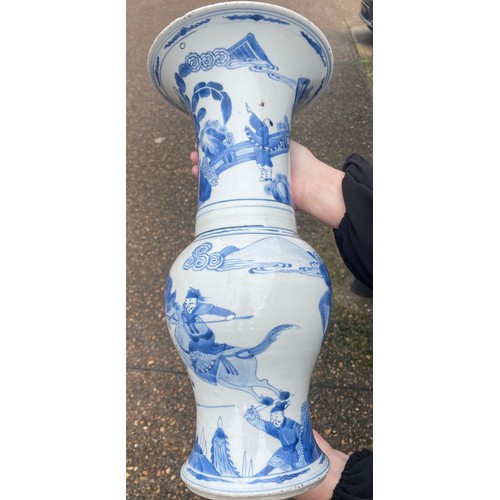 1 - A large Chinese Kangxi blue and white baluster vase, decorated with scenes of warriors and figures o... 