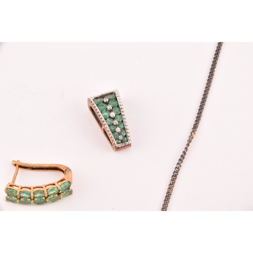 60 - A silver gilt and emerald pendant necklace set with mixed marquise-shaped emeralds, together with a ... 