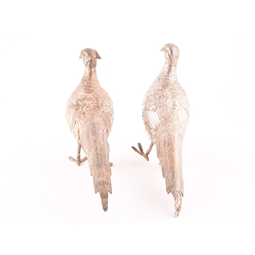 108 - A George VI pair of silver ornamental pheasants, both with import marks for London 1936 by Israel Se... 