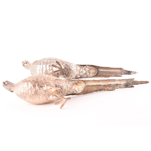 108 - A George VI pair of silver ornamental pheasants, both with import marks for London 1936 by Israel Se... 