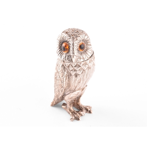 110 - A silver owl pepperette and a silver bird bird holder, owl has orange stone eyes and a detachable he... 