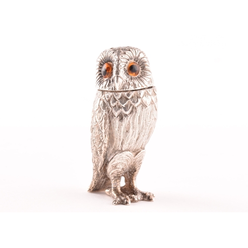 110 - A silver owl pepperette and a silver bird bird holder, owl has orange stone eyes and a detachable he... 