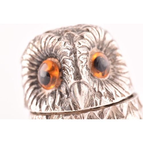 110 - A silver owl pepperette and a silver bird bird holder, owl has orange stone eyes and a detachable he... 