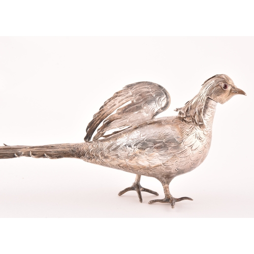 113 - An ornamental silver pheasant, import mark for Chester 1903 by Samuel Boyce Landeck, articulated win... 