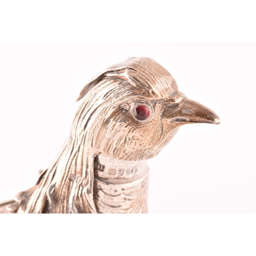 113 - An ornamental silver pheasant, import mark for Chester 1903 by Samuel Boyce Landeck, articulated win... 