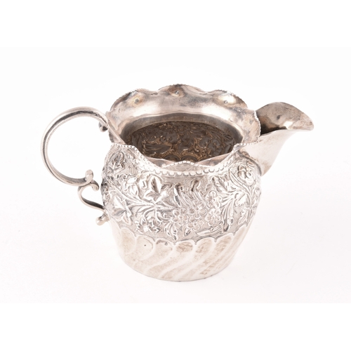 115 - A Group of silver items, including two jugs, one hallmarked for Birmingham 1892 by Nathan & Haye... 