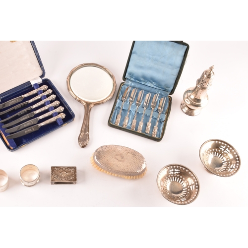 116 - A group of assorted silver items including a pair of baskets with hallmarks for London 1914, a pair ... 