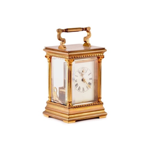 273 - A late 19th/early 20th century ormolu carriage clock, white enamel dial with subsidiary seconds dial... 