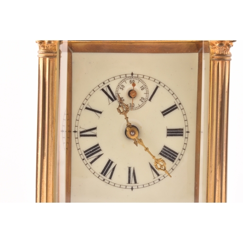 273 - A late 19th/early 20th century ormolu carriage clock, white enamel dial with subsidiary seconds dial... 