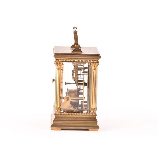 273 - A late 19th/early 20th century ormolu carriage clock, white enamel dial with subsidiary seconds dial... 