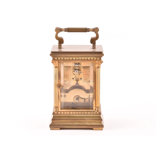 273 - A late 19th/early 20th century ormolu carriage clock, white enamel dial with subsidiary seconds dial... 