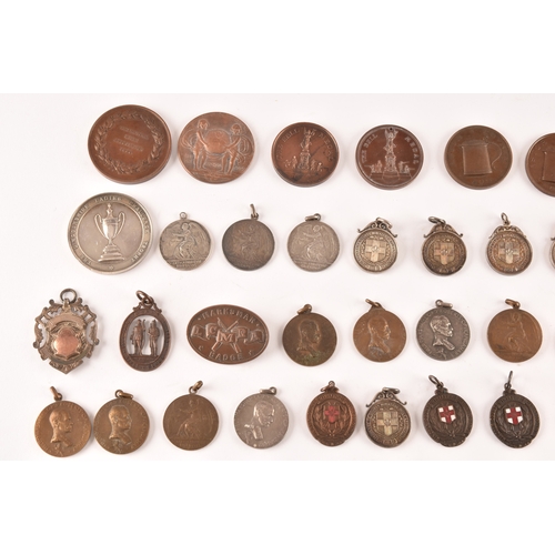 323 - Rifiles and Shooting Interest.A collection of silver and bronze medallions including Lincolnshire Co... 