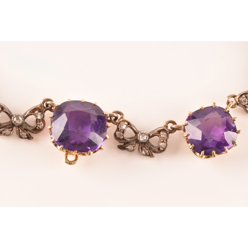 6 - A 15ct yellow gold amethyst and diamond necklace set with five cushion shape amethysts with a combin... 