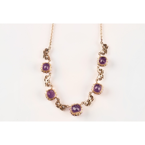 6 - A 15ct yellow gold amethyst and diamond necklace set with five cushion shape amethysts with a combin... 