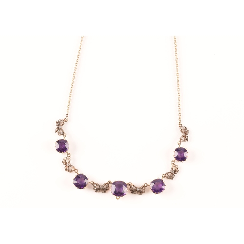 6 - A 15ct yellow gold amethyst and diamond necklace set with five cushion shape amethysts with a combin... 