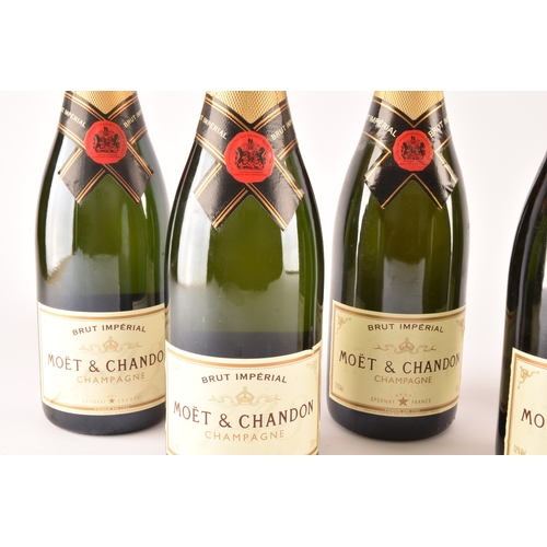 312 - Five bottles of Moët & Chandon Brut Impérial champagne, including a 1990 and 1992 bottle, each 7... 