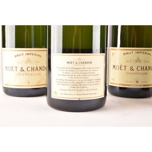 312 - Five bottles of Moët & Chandon Brut Impérial champagne, including a 1990 and 1992 bottle, each 7... 